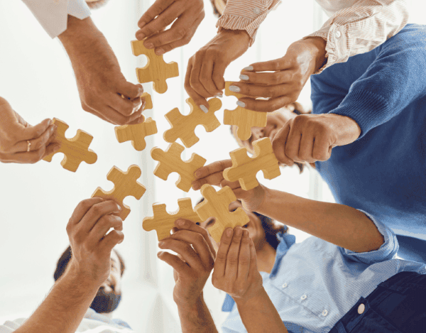 Business professionals engaging in a collaborative discussion with a client